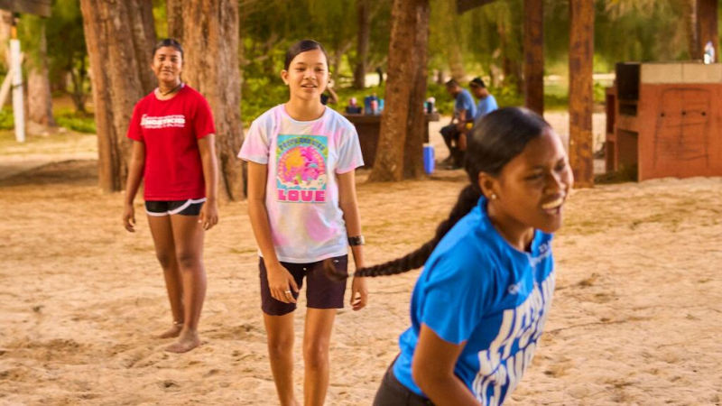 Young Palauans play volleyball in Kuabes park, an area that could be underwater in the next 30 years.